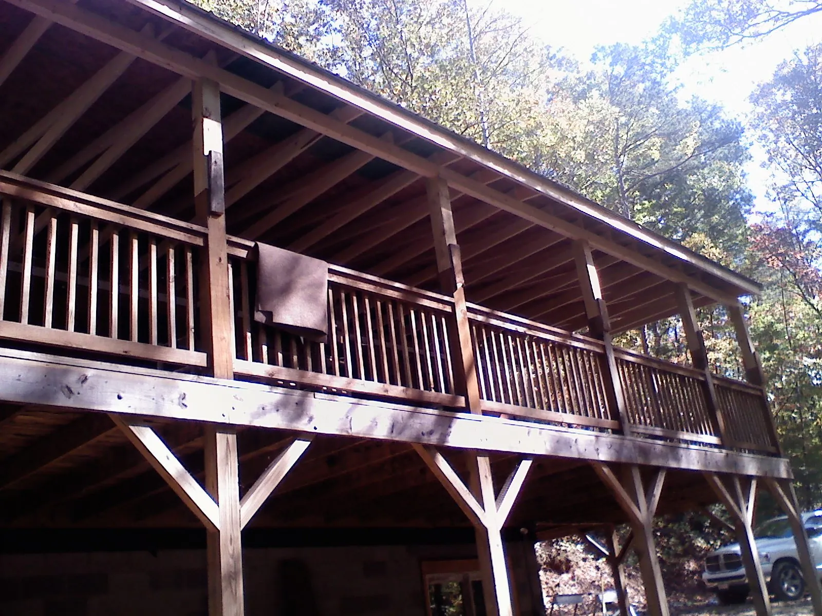 Timber framing under a new elevated porch and deck — Roof Leak Repair in Molt by Roofing Brothers